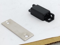 Is the Unreliable Closing of Equipment Door Panels Caused by Magnetic Latches?
